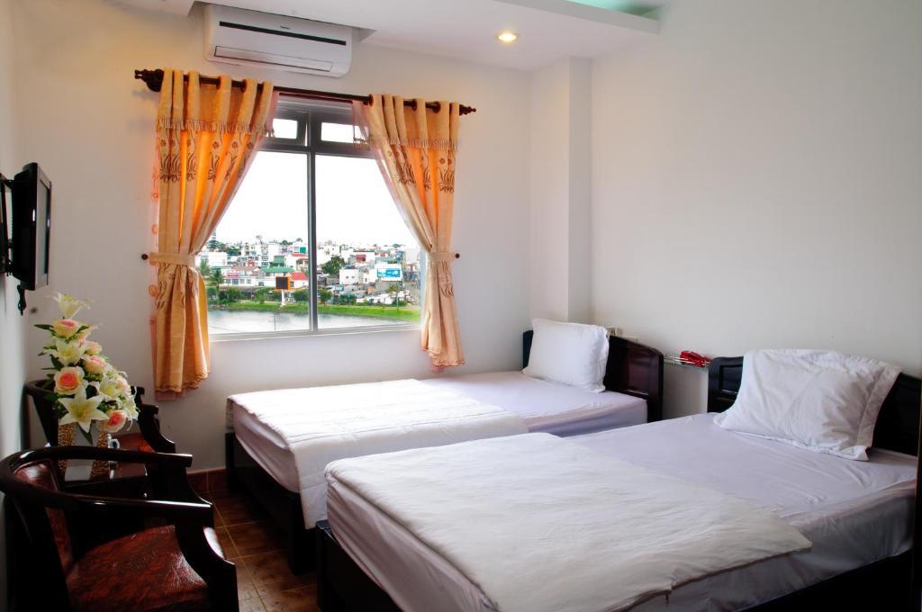 Minh Quan Hotel Bảo Lộc Quarto foto