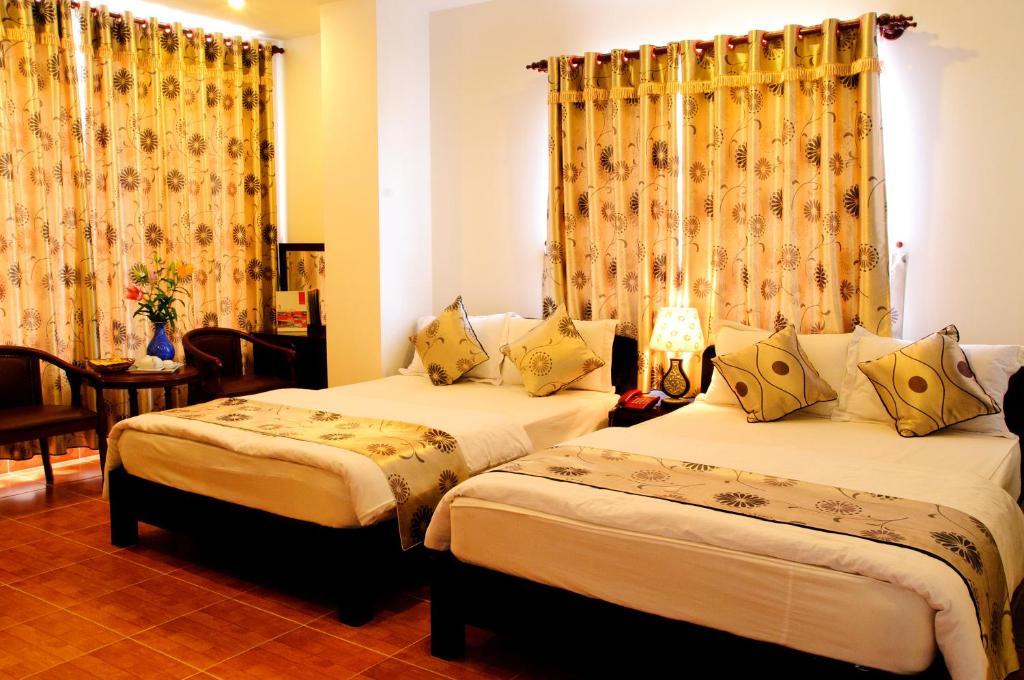 Minh Quan Hotel Bảo Lộc Quarto foto